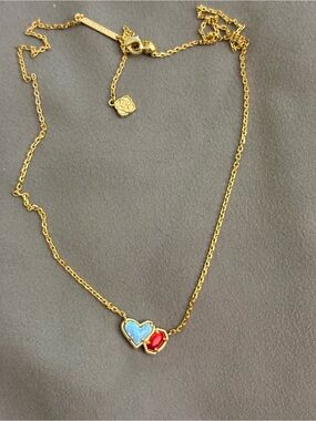 Kendra Scott Gold Necklace with light Blue opal heart and Red Stones